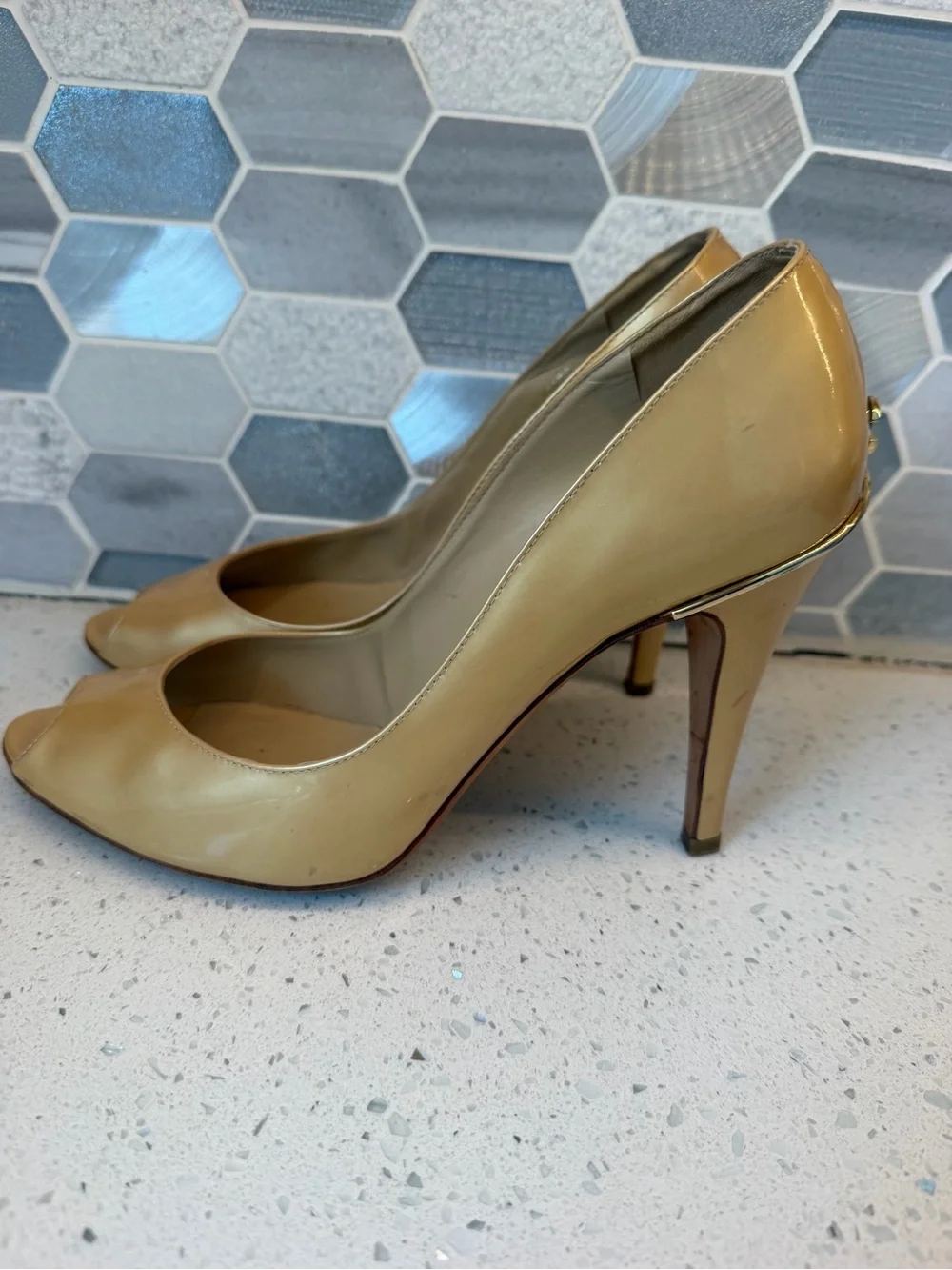 Name Your Price. CHANEL Gold Patent Leather Heels with CC Logo